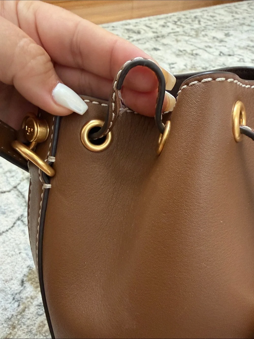 Tory Burch Classic Brown Leather Bucket Bag with Gold Hardware